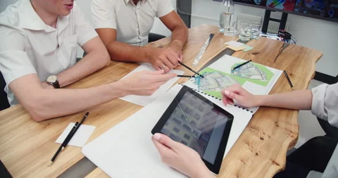 Architects are working on the design of the house Stock Footage 159550846
