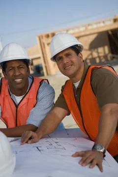 Architects With Blueprint Stock Photos