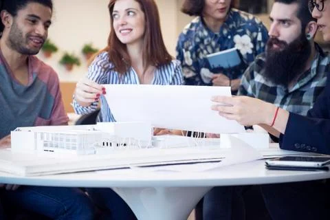 Architects collaborating on project Stock Photos