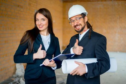 Architects on a consruction site Stock Photos