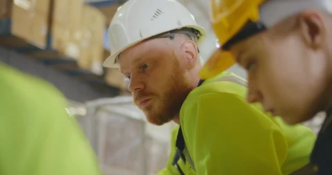 Architects discussing a construction plan Stock Footage 112059407