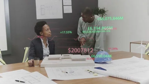 Architects discussing model, colleague coming and pointing at plans, budget Stock Footage 333105853