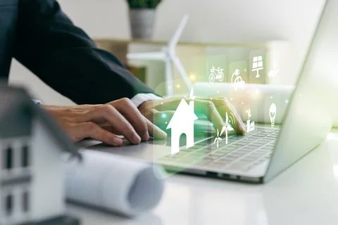Architects engineer using laptop with home design combined. 写真素材