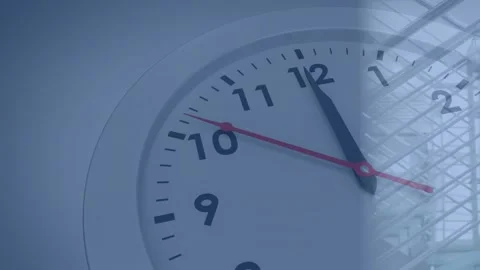 Architects exploring atrium structure using animated clock overlay and Stock Footage 330659845