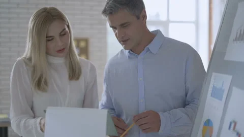 Architects in office working on construction project 4K Stock Footage 112674850