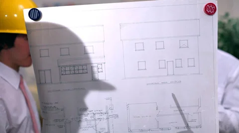 Architects or engineers in creative office looking at design plans. High quality 動画素材 32749834