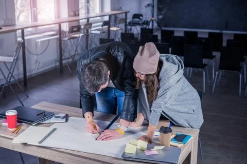 Architects people drawing construction project on desk. Stock Photos
