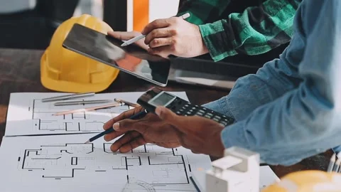 Architects plan blueprints in design project on tablet pc Stock Footage 325476527