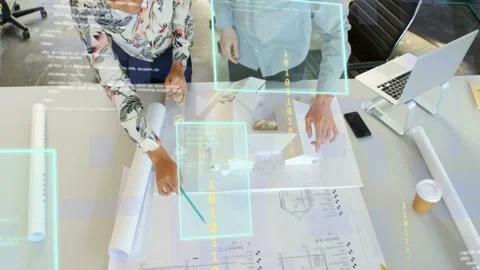 Architects pointing at plan, activating AR overlays and adjusting model for Stock Footage 333300796