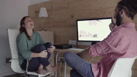 Architects speaking about project in front of computer screen Stock Footage 132810274