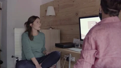 Architects speaking about project in front of computer screen Stock Footage 132810293