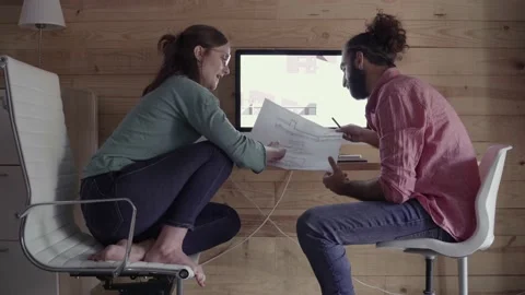 Architects speaking about project in front of computer screen Stock Footage 132810306