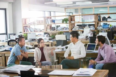 Architects talking in the office Stock Photos