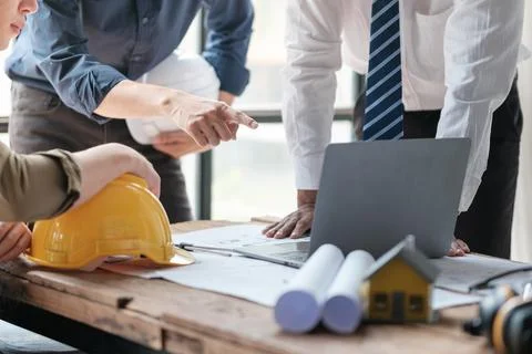 Architects talking at the table Teamwork and Workflow Creation Concepts, Close Stock Photos