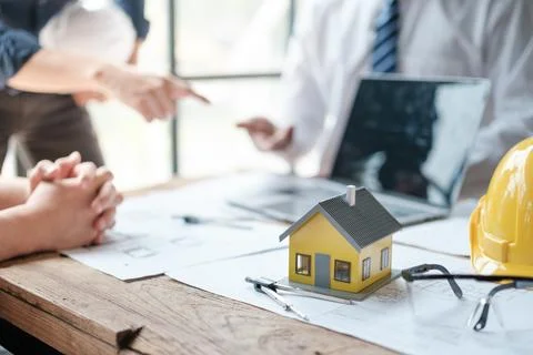 Architects talking at the table Teamwork and Workflow Creation Concepts, Close Stock Photos