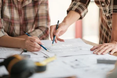 Architects talking at the table Teamwork and Workflow Creation Concepts, Close Stock Photos