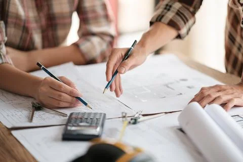 Architects talking at the table Teamwork and Workflow Creation Concepts, Close Stock Photos