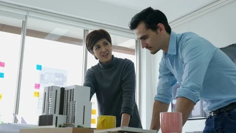 Architects team are working on a building model. Stock Footage 93735417