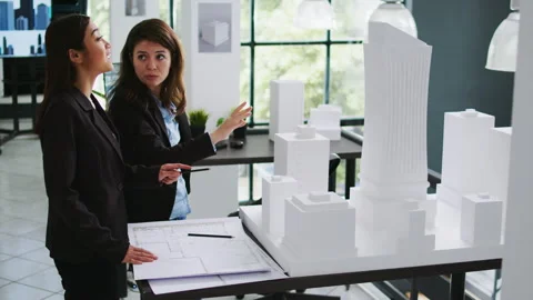 Architects team sharing high five after making progress Stock Footage 262998383