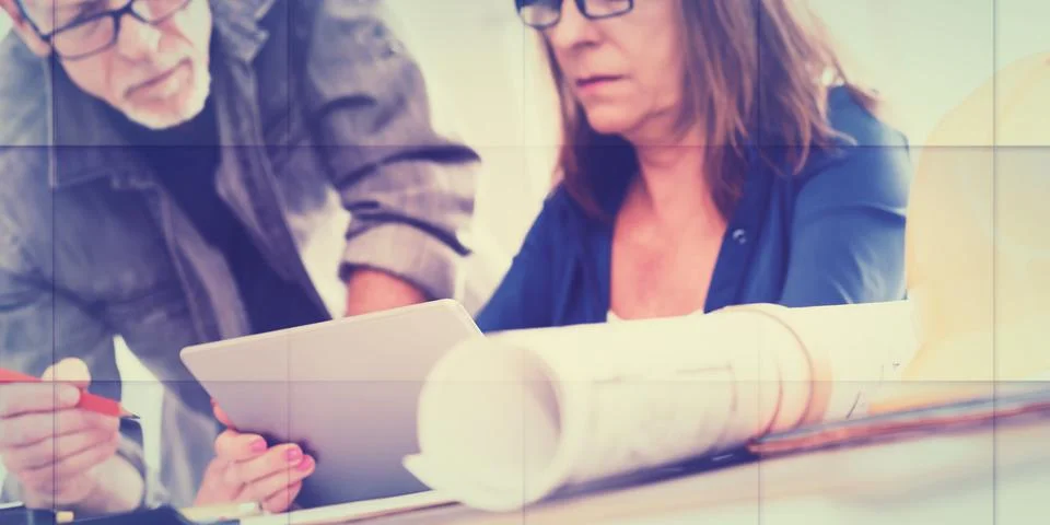 Architects working on plans, geometric pattern Stock Photos
