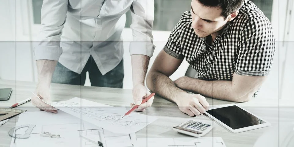 Architects working on plans, geometric pattern Stock Photos