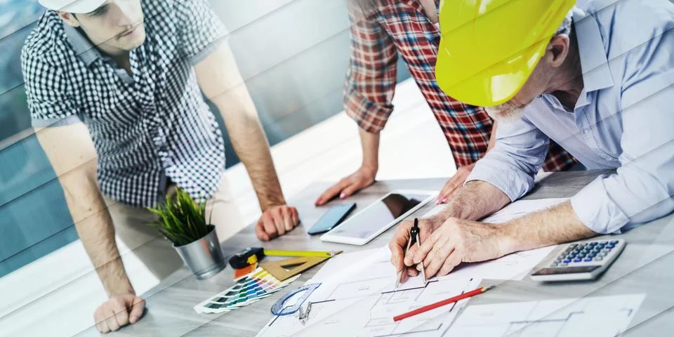 Architects working on plans, light effect, geometric pattern 스톡 사진