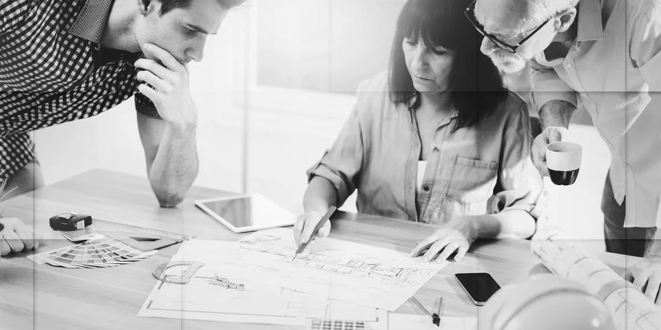 Architects working on plans, light effect, geometric pattern Stock Photos