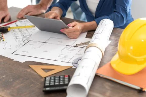 Architects working on plans 스톡 사진