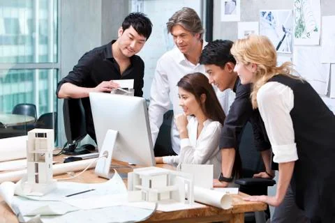 Architects working in studio Stock Photos