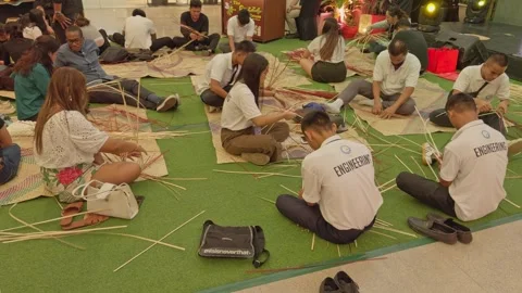 Architectural and engineering students learning about bamboo at a free workshop. Stock Footage 284516935