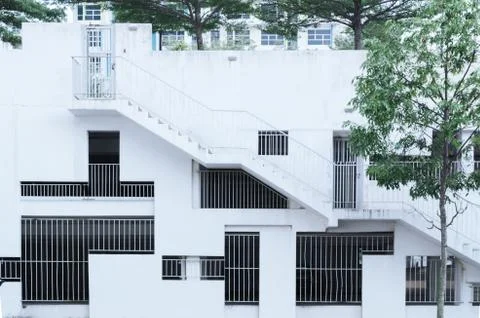 Architectural background grille windows different shapes  at white wall Stock Photos