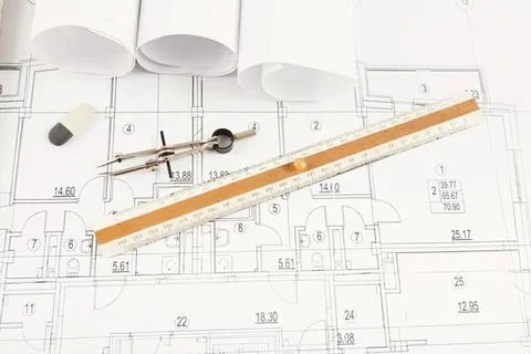 Architectural blueprint with ruler and compass on paper Stock Photos