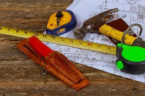 Architectural blueprints and instruments on the worktable. Construction backg Stock Photos