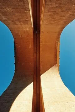 Architectural bridge structure viewed from below, showcasing intricate desi.. Stock Photos