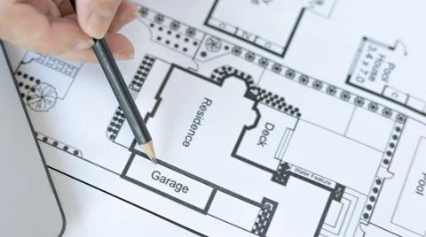 Architectural building design and construction plans with blueprints, Young m Stock Photos