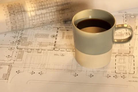 Architectural cad drawing with coffee Stock Photos