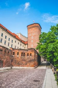 Architectural complex of an ancient, medieval castle on sunny weather Stock Photos