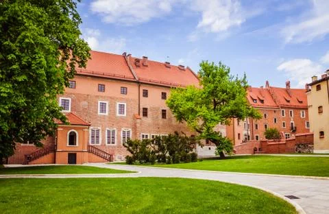 Architectural complex of an ancient, medieval castle on sunny weather Stock Photos