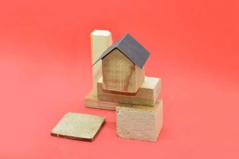 Architectural composition of the modules of the house surrounded by wooden fi Stock Photos
