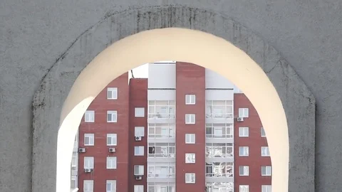 Architectural composition. Stone arch leading to inner courtyard of the building Stock Footage 77574829
