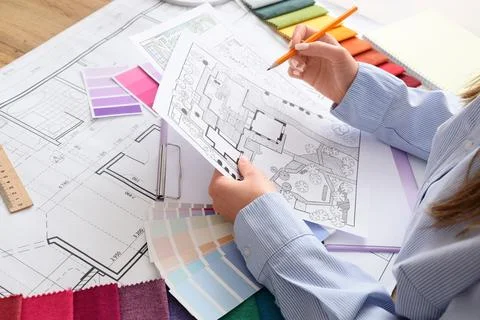 Architectural design process with blueprint landscape plan color swatches and Stock Photos