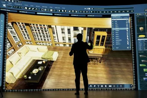 Architectural designer interacts with immersive 3D building visualization Stock Photos