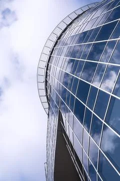 Architectural detail of the facade with multiple reflections of other build.. Stock Photos