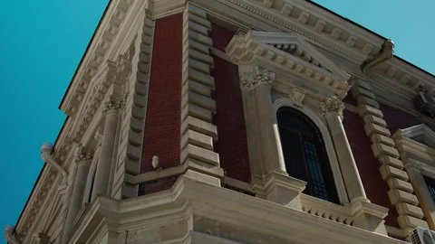 Architectural Detail panning shot of classical building facade Stock Footage 338243888