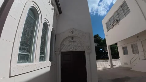 Architectural detail of side window and rear door on historic church Stock Footage 320211931