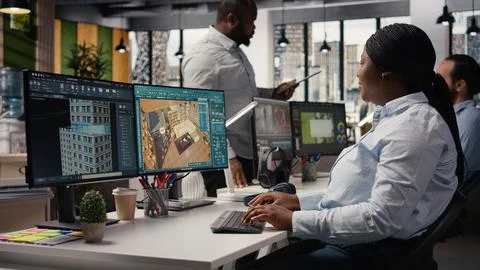 Architectural developer using CAD software to develop detailed floor plan Stock Photos