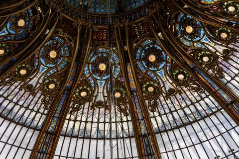 Architectural dome over a building with multi-colored stained glass. Paris,.. Stock Photos