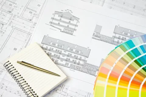 Architectural drawing and notepad Stock Photos
