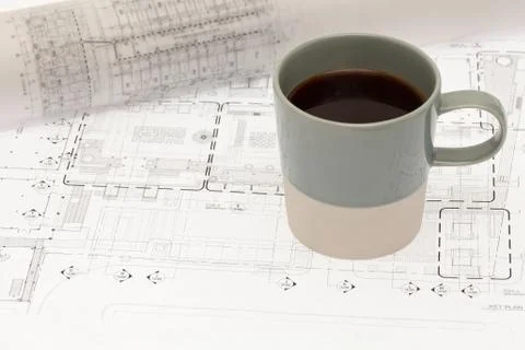 Architectural drawing with coffee cup Stock Photos