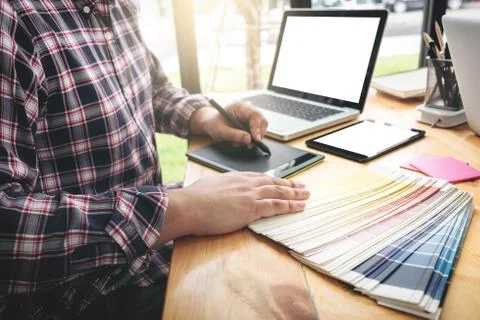 Architectural drawing with work tools, Graphic designer working with digital Stock Photos